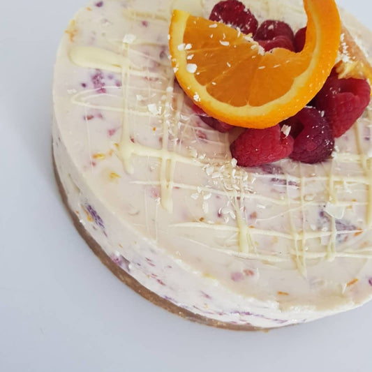 White chocolate, orange and raspberry no bake cheesecake